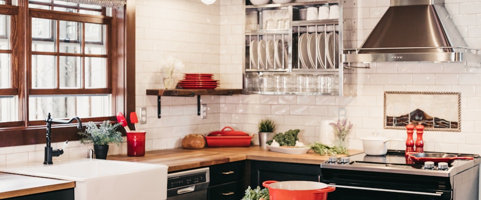 Warm natural kitchen with wooden utensils and clean surfaces