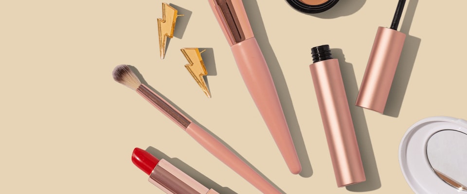 Skincare and cosmetic products arranged on a clean surface