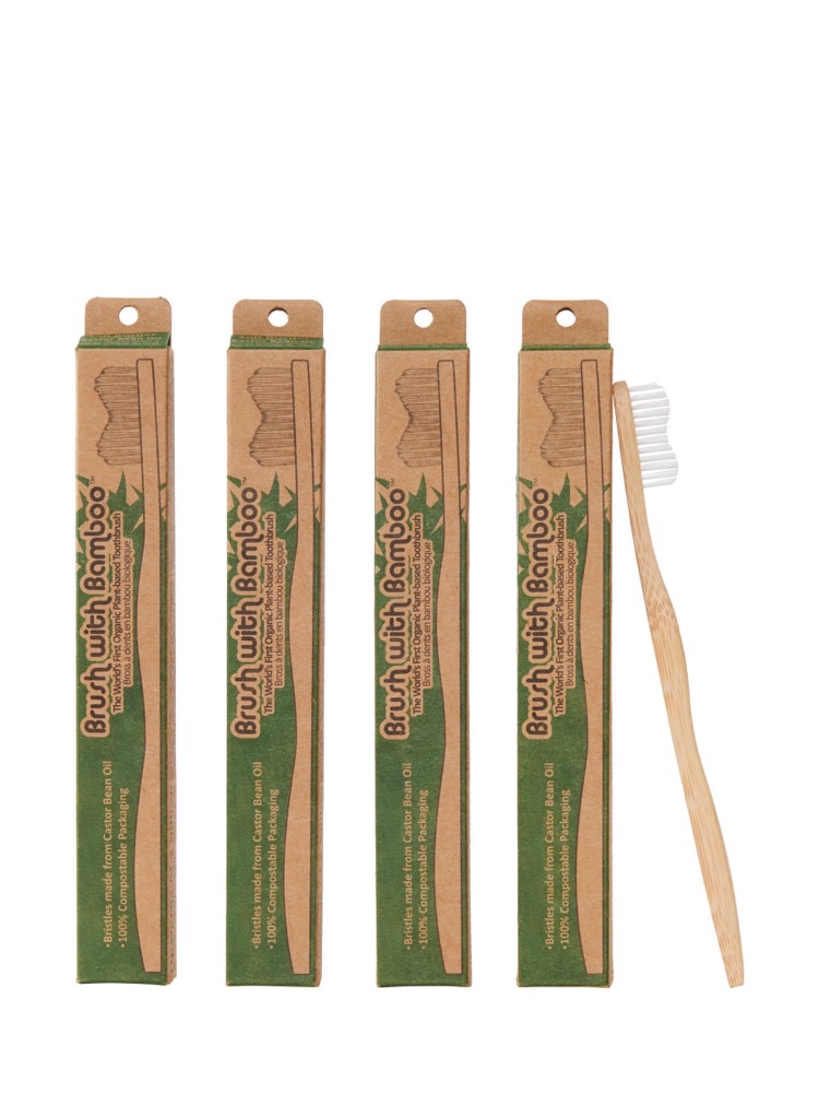 Brush with Bamboo adult toothbrush — bamboo handle with plant-based castor-oil bristles in compostable cardboard packaging