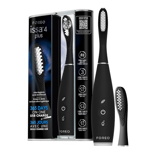 FOREO ISSA 4 Plus silicone sonic electric toothbrush in black with a spare hybrid wave brush head and its retail carton