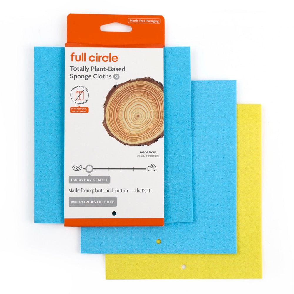 Full Circle Squeeze cellulose sponge cloths in blue and yellow shown with their plastic-free cardboard package on a white background