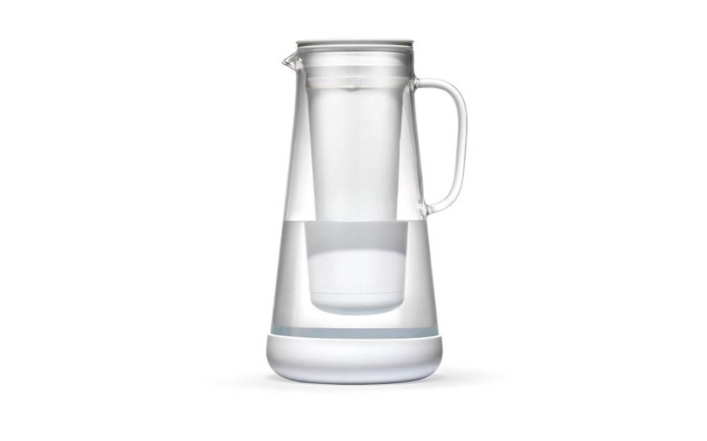 LifeStraw Home 7-cup glass water filter pitcher with white silicone base and membrane microfilter inside the borosilicate glass carafe