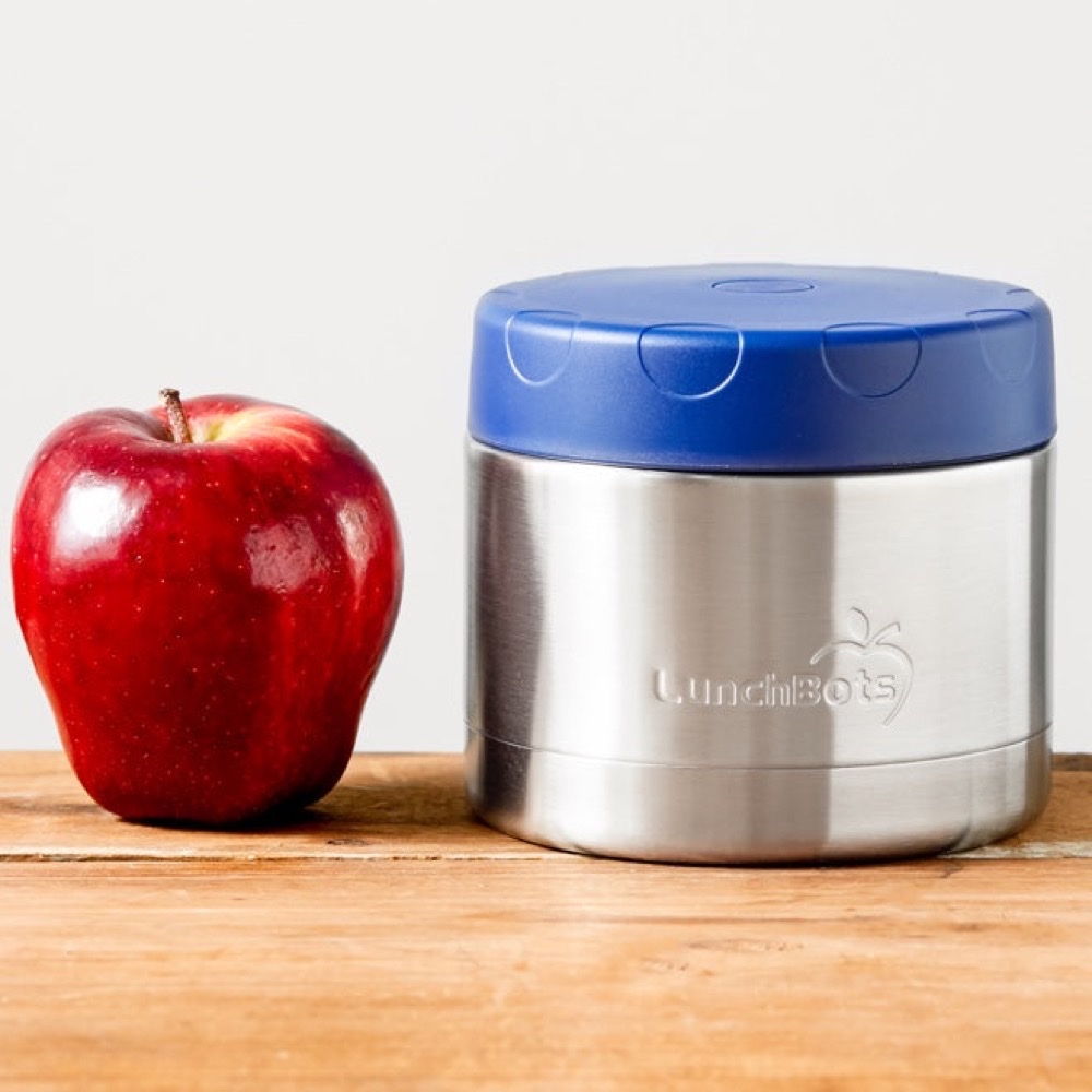 LunchBots Thermal insulated stainless steel food container with a navy lid, shown beside an apple for scale