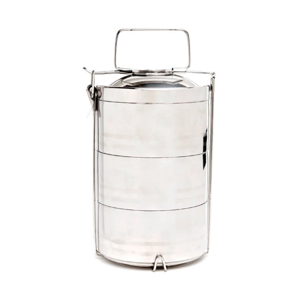 Onyx stainless steel 3-layer tiffin — three stacked round stainless tiers held by a metal carrying clasp, fully plastic-free