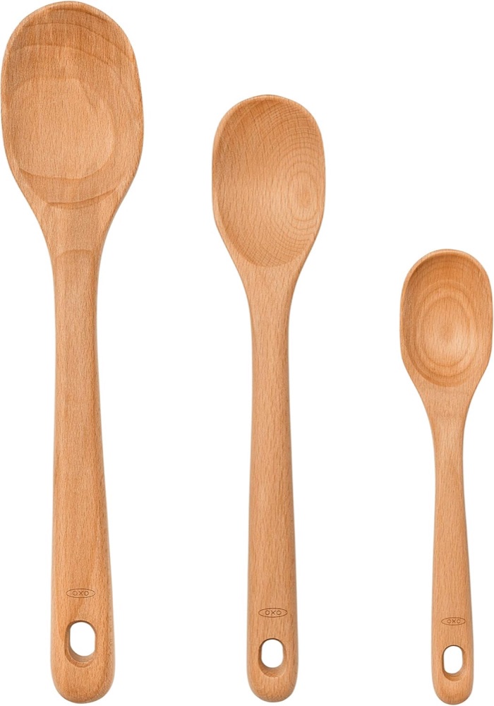 Three OXO beechwood spoons in small, medium and large