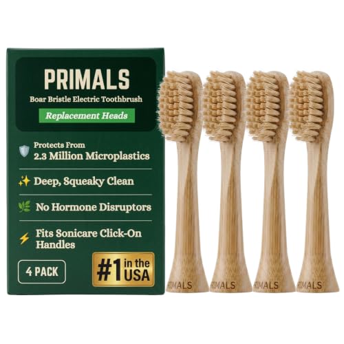 PRIMALS boar bristle replacement brush heads with bamboo bases, four pack, beside their green carton