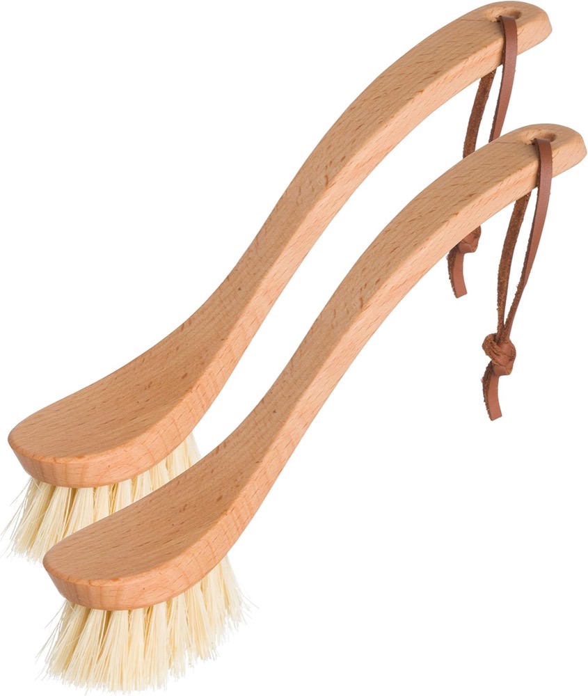 Redecker curved ergonomic dish brushes — S-shaped oiled beechwood handles with leather loops and natural tampico bristles