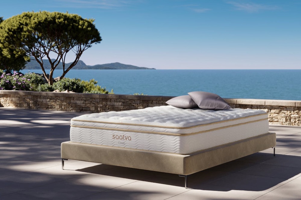 Saatva Classic mattress — Euro pillow-top innerspring with organic cotton cover and no fiberglass, shown outdoors