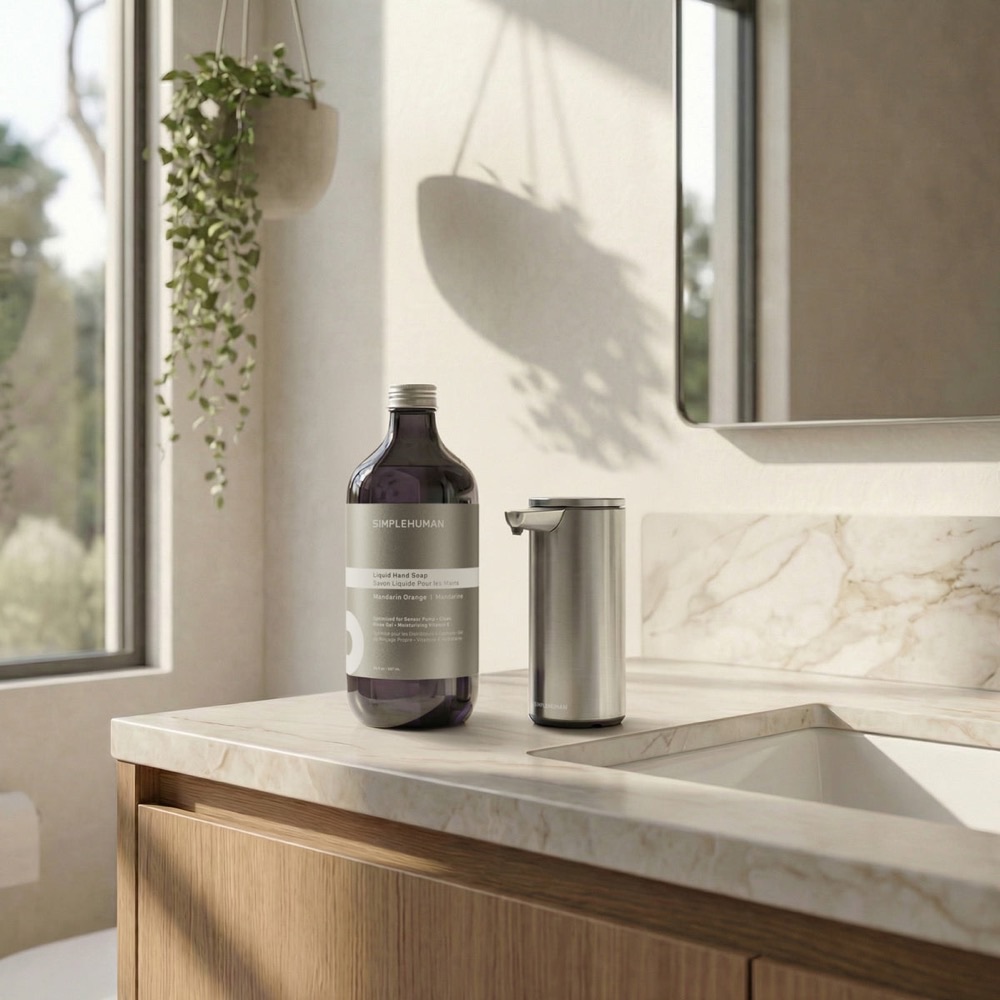 simplehuman rechargeable touchless sensor soap pump in brushed stainless steel on a white background