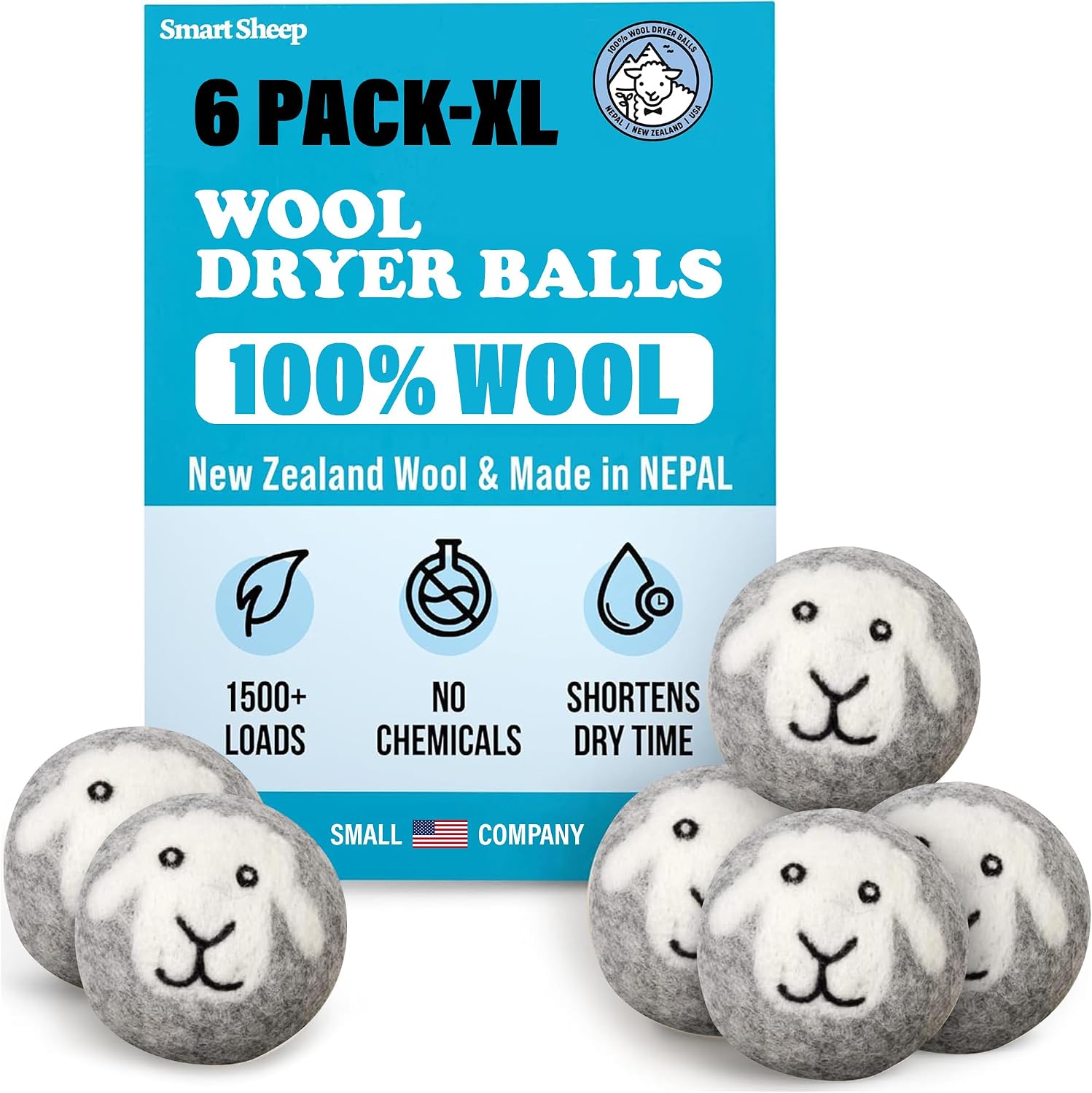 Six grey and white felted wool dryer balls with stitched sheep faces arranged in front of a Smart Sheep retail box
