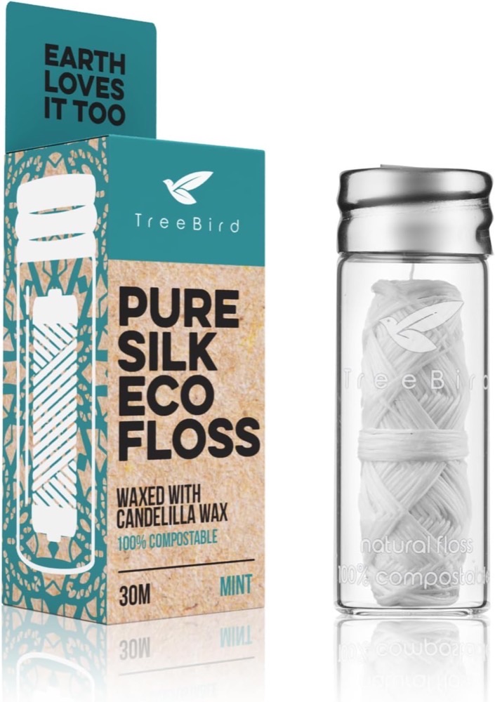 TreeBird Pure Silk Eco Floss — peace silk waxed with candelilla wax in a refillable glass jar, no PFAS or PTFE